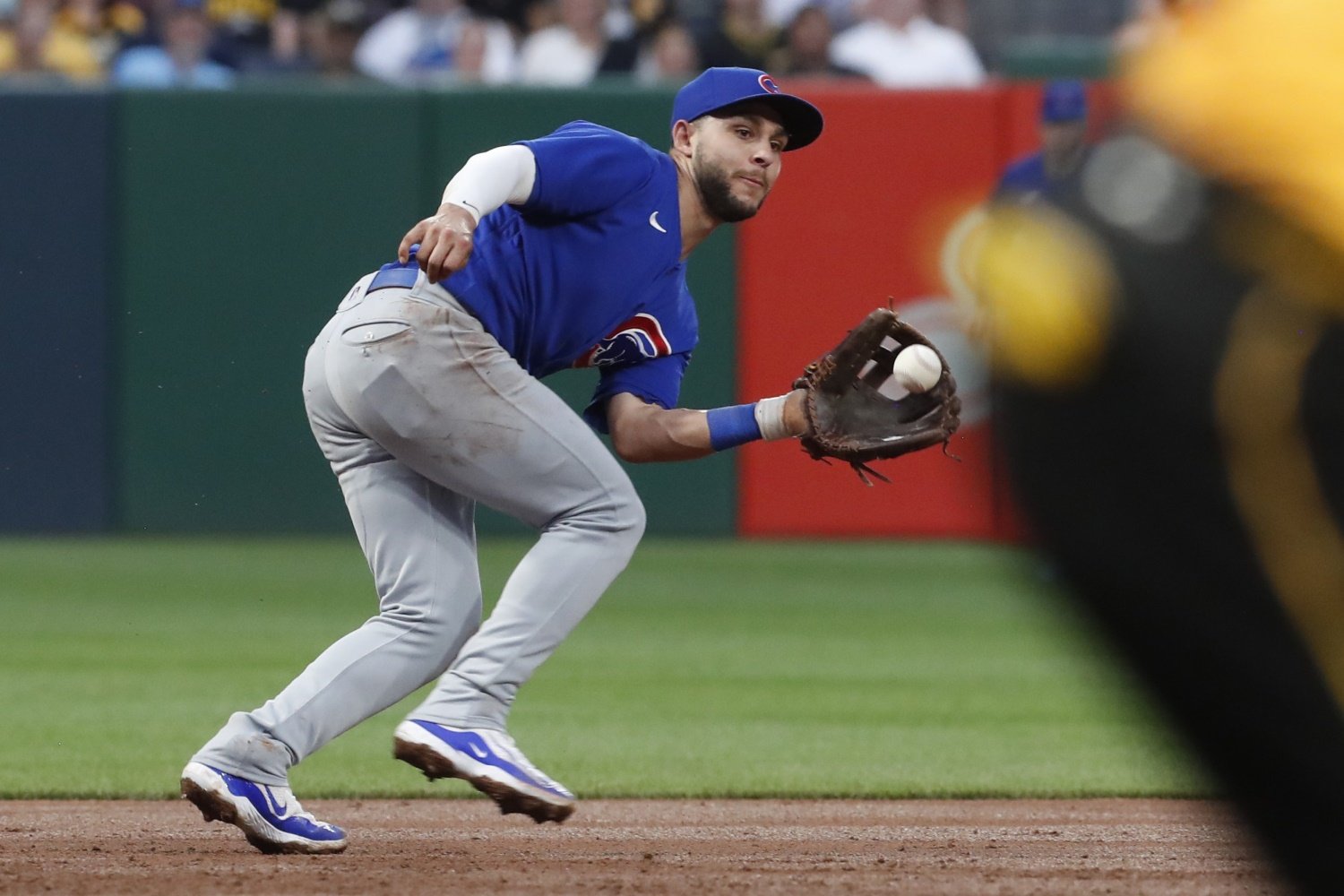 Nolan Arenado throws Nick Madrigal out at home