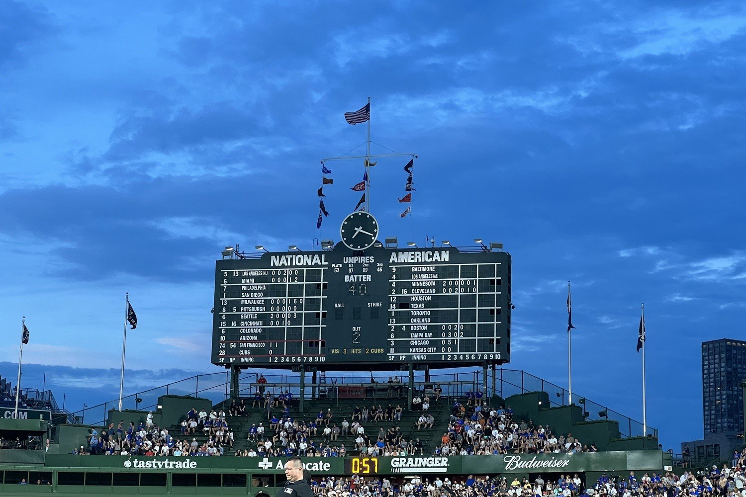 wrigley-field-entrance-sign-at-night - Baseball Brew Crew