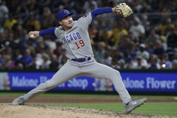 New Cubs right-hander Jose Cuas brings unique arm slot, story to bullpen -  Chicago Sun-Times