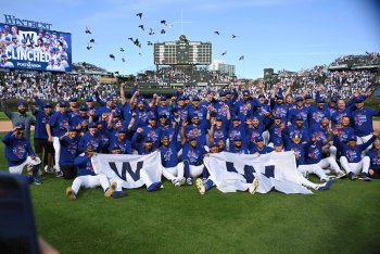 Powered By Departing Heroes, Cubs Clinch Playoff Berth in Last Chance Before Home Fans